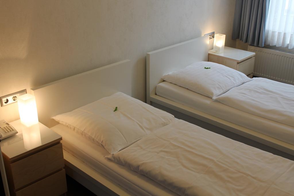 Hotel Weidenhof Дюселдорф Стая снимка